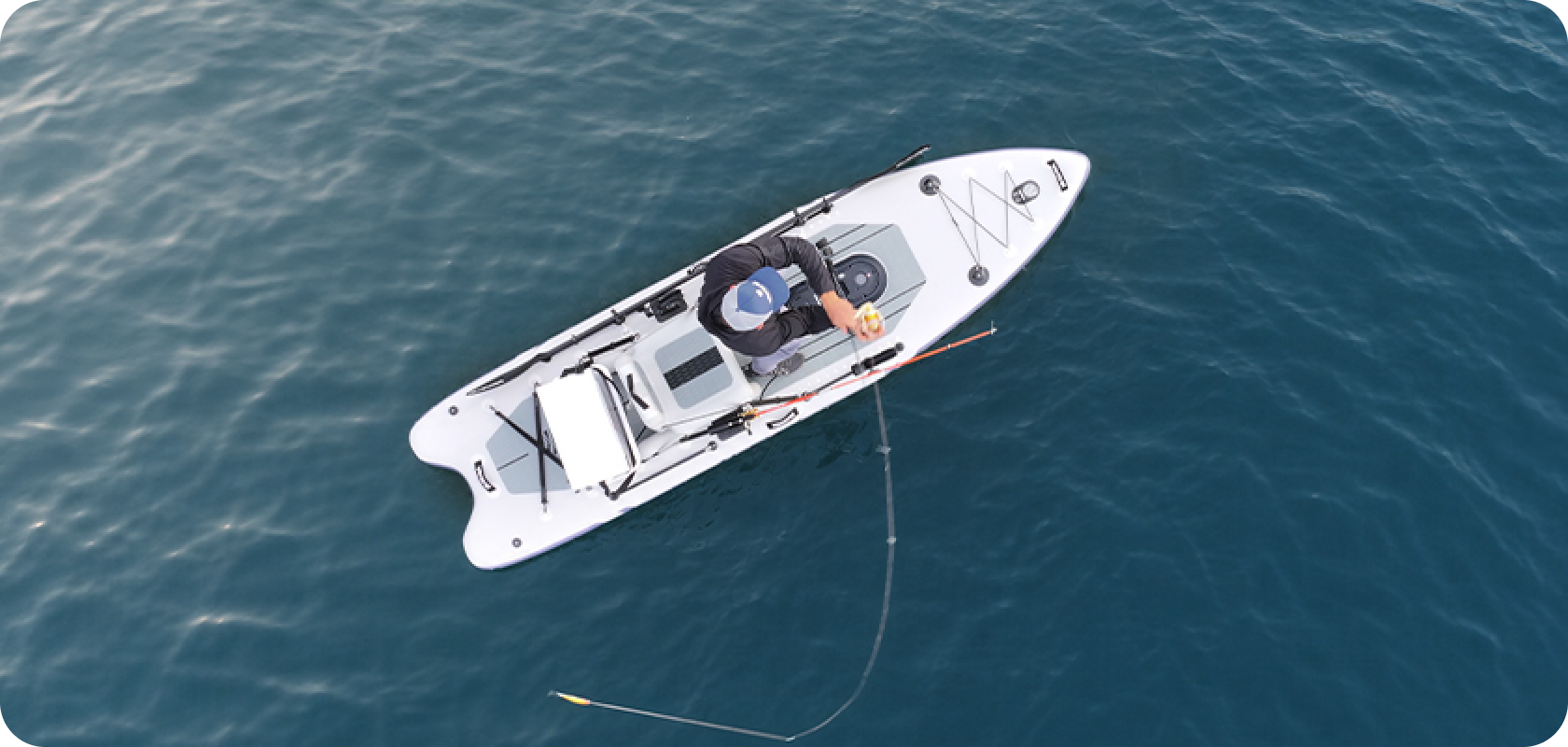 Ventral fishing SUP on the water